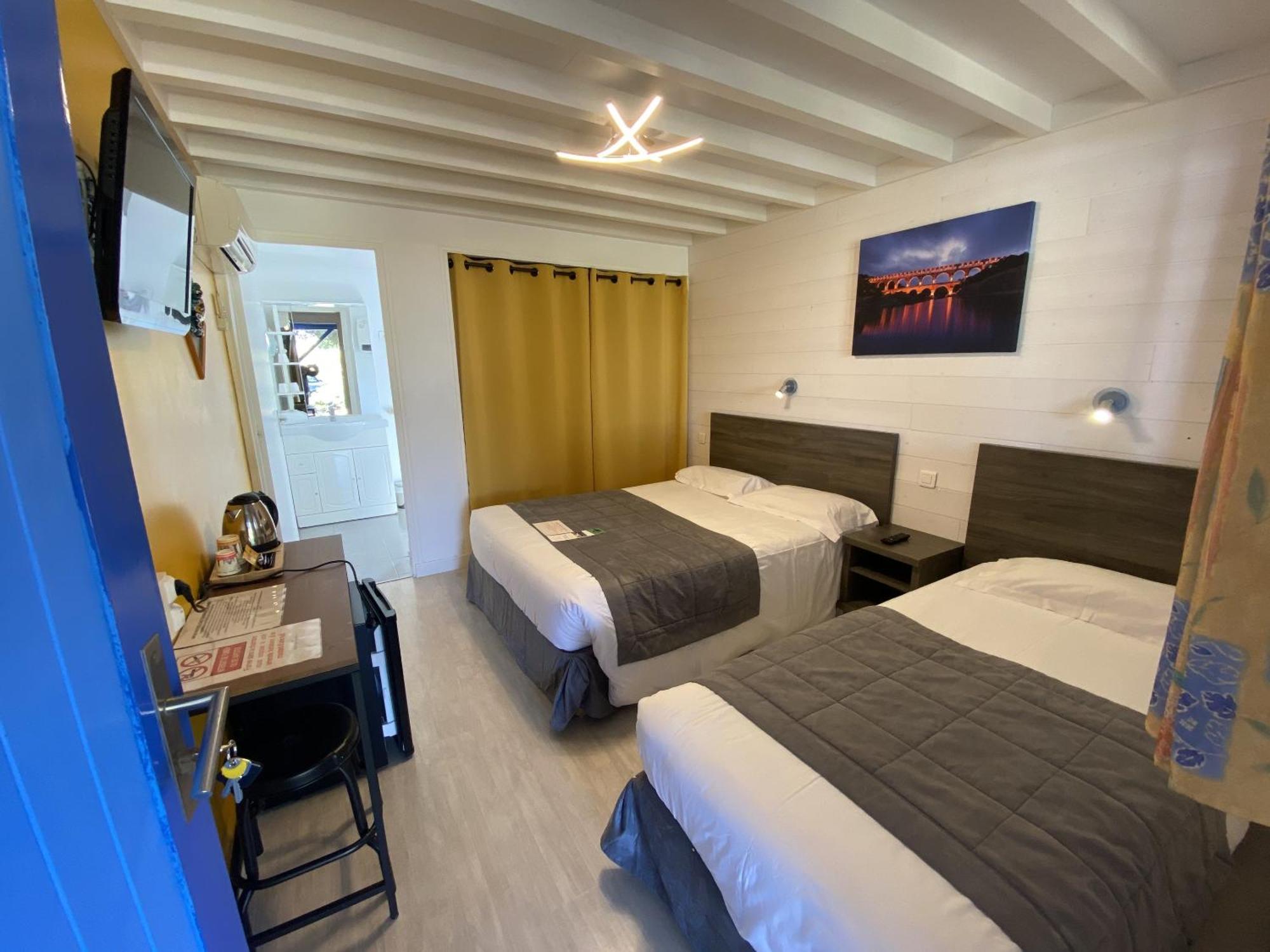 Hotel Des 4 Vents "Esprit Camargue" Aigues-Mortes Habitación foto